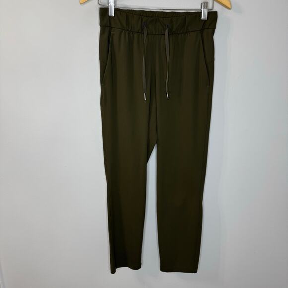 Lululemon On the Fly 7/8 Pant Drawstring Woven Dark Olive Women's 4 - Picture 8 of 11